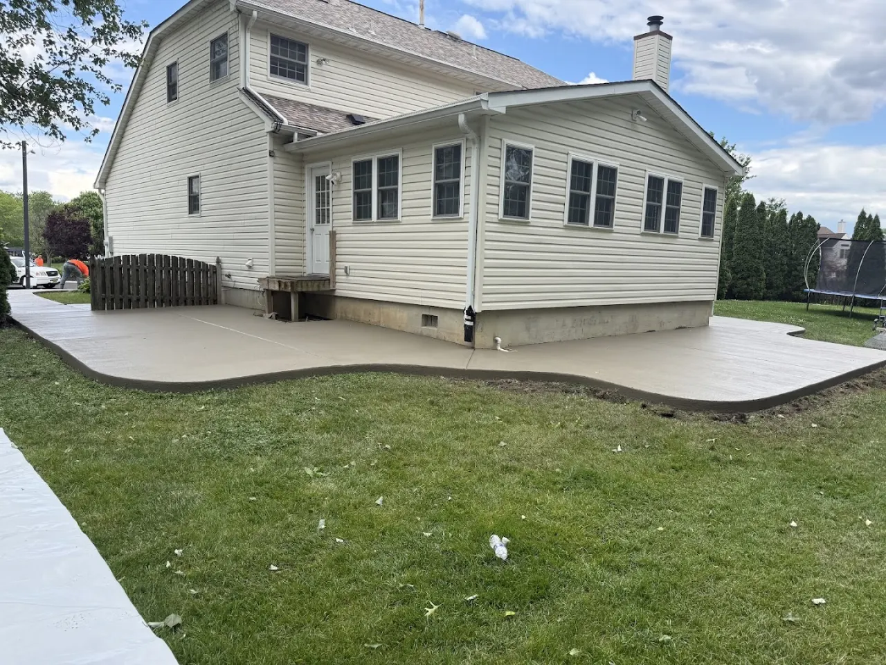 Large backyard concrete patio poured at a South Jersey home